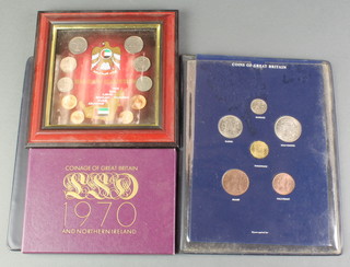 A 1967 coins of Great Britain presentation set, 1970 ditto and a framed set of UAE coins