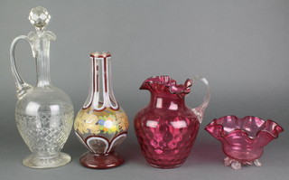 A Victorian cranberry dimpled vase with wavy rim and clear handle 8", a ditto bowl and 2 decanters