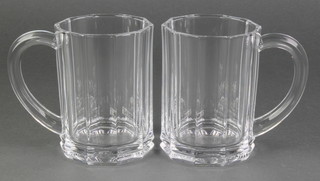 A pair of faceted clear glass Tiffany & Co pint mugs, boxed 