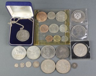 A 1935 crown and minor coins