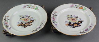 A pair of 19th Century Davenport stoneware hot water plates