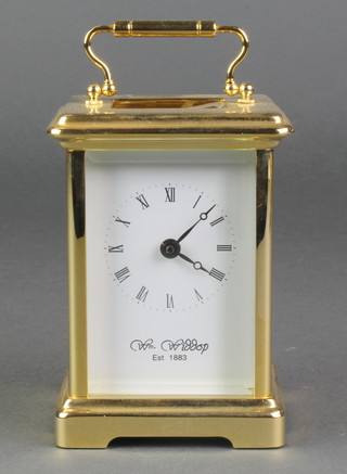 William Widdop, a 20th Century carriage clock with enamelled dial and Roman numerals contained in a gilt case 