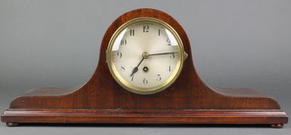 A 1930's timepiece with silvered dial and Arabic numerals contained in a mahogany Admiral's hat shaped case 