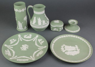 A Wedgwood green Jasperware cylindrical vase 6 1/2", 2 plates, a candlestick a jug and a box 