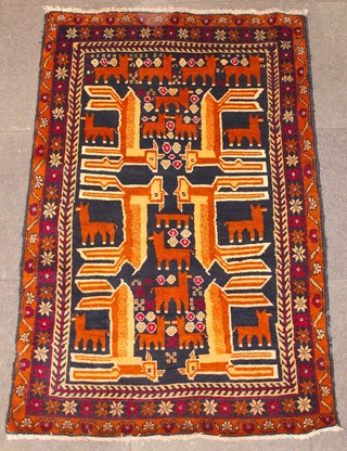 A black ground Persian Herathi rug decorated various animals 56 1/2" x 36" 