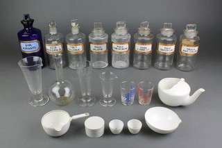 A Victorian blue glass pharmacy bottle, 7 others and a quantity of glass and ceramic vessels