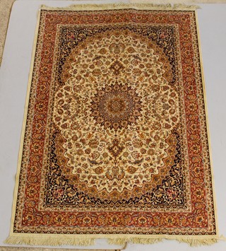 A gold ground Belgian cotton Persian style rug with central medallion 89" x 63 1/2" 