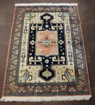 A machine made Caucasian style white and blue ground rug 93" x 96" 