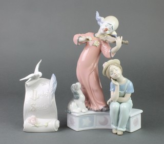 A Lladro group of a clown playing a violin next to a seated lady and puppy, 6900, boxed 11", together with a Lladro Society sign 4" 