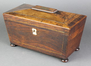 A 19th Century rosewood sarcophagus twin compartment tea caddy with hinged lid, mother of pearl escutcheon and brass stringing,  raised on bun feet 6"h x 11"w x 5 1/2"d  