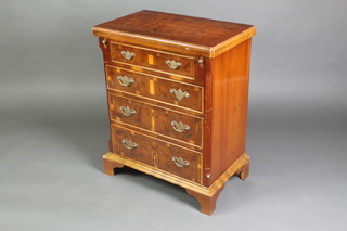 A Georgian style yew bachelors chest fitted 4 long graduated drawers, raised on bracket feet 30"h x 24"w x 15"d 