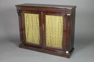 A Regency rosewood chiffonier fitted a cupboard enclosed by grilled panelled metal doors and having columns to the side 35 1/2"h x 43 1/2"l x 13"d 