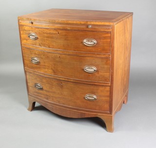 A Georgian mahogany bow front chest with crossbanded top and satinwood stringing, fitted a brushing slide above 3 long drawers, raised on bracket feet 35"h x 33"w x 23"d 