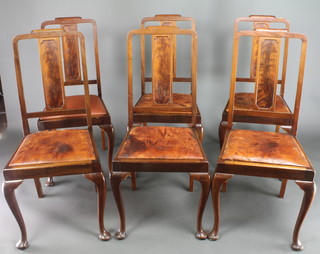 A set of 6 1930's Queen Anne style mahogany slat back dining chairs with upholstered seats, raised on cabriole supports