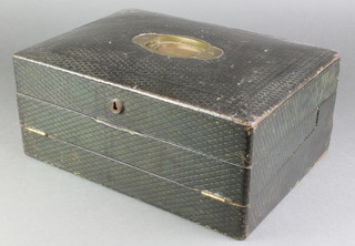 A Victorian leather covered writing slope with hinged lid, the interior with stationery rack, 6"h x 14"w x 10"d 