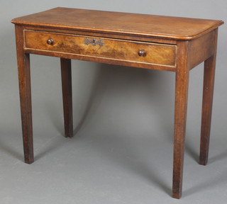 A Victorian rectangular mahogany side table fitted a drawer with tore handles on square tapered supports 29"h x 36"w x 18"d 