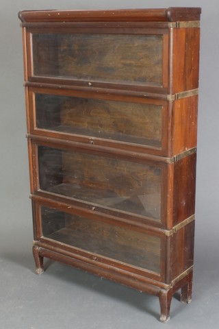 A mahogany 4 tier Globe Wernicke style bookcase on cabriole supports 55"h x 34"w x 10 1/2"d 