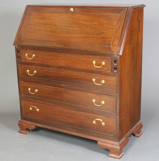 A Chinese hardwood bureau, the fall front revealing a well fitted interior above 4 long drawers with brass swan neck drop handles, raised on ogee bracket feet 41"h x 36"w x 18"d 