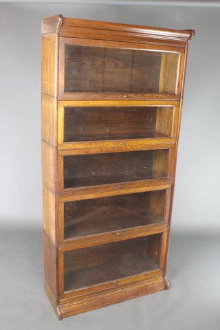 An oak 5 tier Globe Wernicke style bookcase 52"h x 34"w x 13"d 
