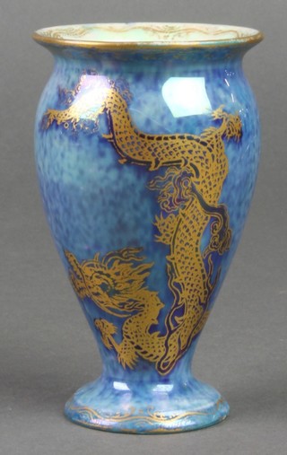 A Wedgwood lustre oviform vase, the blue ground decorated a dragon chasing a flaming pearl 4" 