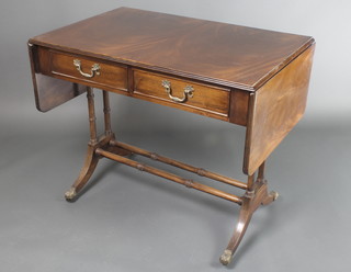 A Georgian style mahogany sofa table fitted a drawer, raised on 4 turned supports with H framed stretcher 29"h x 22"w x 36" when closed x 61" when open