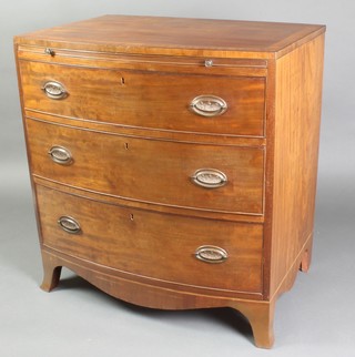 A Georgian mahogany bow front chest with crossbanded top and satinwood stringing, fitted a brushing slide above 3 long drawers, raised on bracket feet 35"h x 33"w x 23"d 