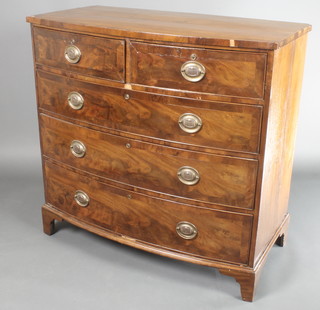 A 19th Century mahogany bow front chest of 2 short and 3 long drawers with oval plate handles, raised on bracket feet 40 1/2"h x 42"w x 22"d 