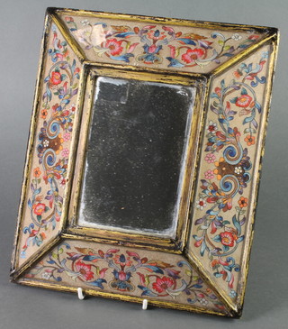 A 19th Century rectangular plate wall mirror contained in a Persian style cushion shaped frame 12" x 10" 