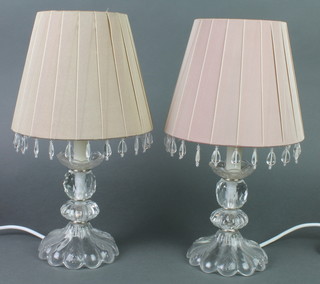 A pair of faceted glass table lamps, the shades with glass drops 7" 