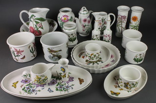 A quantity of Portmeirion Botanic Garden tableware comprising a water jug and bowl, 2 jardinieres, 5 vases, 2 oil bottles, 4 vases, an oval dish, 2 flan dishes, 2 large oval dishes, a coffee pot and 2 jugs 