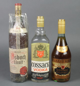 A 1 litre bottle of Asbach Uralt brandy, a bottle of Cossack Vodka, a bottle of Gautret Cognac