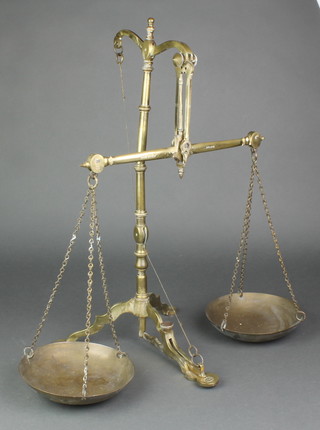 A pair of Doyle & Sons brass scales 