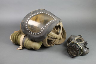 A WWII Civil Defence respirator together with a babies respirator dated 1939 