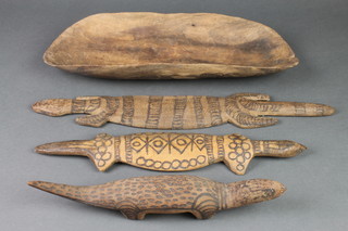 An Aboriginal carved hardwood shield/dish 19" together with 3 carved figures of animals