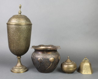A Benares brass engraved cup and cover, 16", an engraved Indian brass cup and cover, a Chinese hexagonal engraved brass bell 3", an Art nouveau embossed copper jardiniere 6" (formerly silver plated)