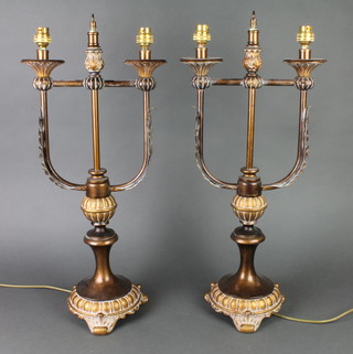 An impressive pair of Empire style twin light table lamps 2'