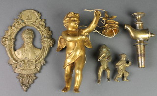 A gilt metal light fitting in the form of a cherub in flight, the sconce in the form of a flower head (f) 9", a cast metal plaque decorated Sir Robert Peel 9" and 2 gilt metal figures 2 and 2 1/2" and a brass spicket