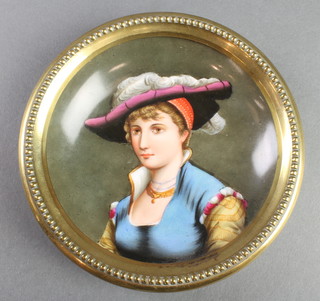 A Continental porcelain dish decorated a portrait of a lady in a brass mount 5 1/2" 
