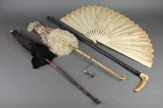 2 Victorian folding parasols, a stag horn handled walking stick and a fan 