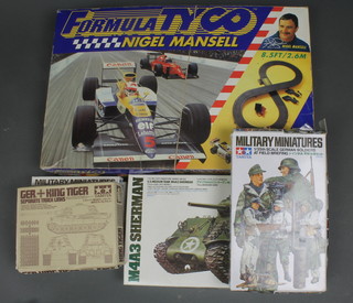 A Formula Tyco Nigel Mansell racing set together with 6 Tamiya military models - made up 
