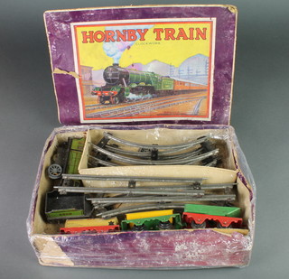 A Hornby clockwork train set, boxed, in battered condition 