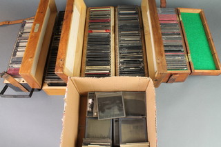 Approximately 350 19th Century glass photographic slides, contained in 5 wooden boxes and a small cardboard box 