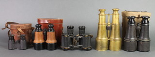 A pair of Bino Military issue binoculars, marked Bino Prism no.2 Mk3 x 6 no.2III73 and Graticules 1 1/2 and 1 1/4 and 1 1943 with crows feet mark, a  pair of brass cased binoculars and 3 other pairs of binoculars 