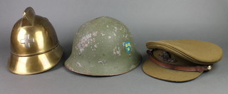 A French/Belgian Adrian medical brass helmet (no liner), a Continental steel helmet with liner and a Royal Artillery Officer's peaked cap by Bates 