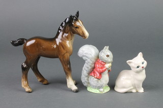 A Beswick figure of a standing pony 6", a Royal Doulton figure of a seated cat 3" and a Beswick Beatrix Potter figure Timmy Tiptoes 3 1/2" 