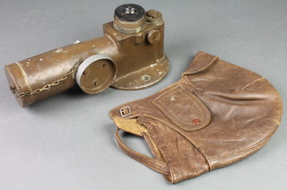 A Military issue bearing telescope no. 8 Mk1, base marked 3301 0.S52-MA 1942 together with a leather fly helmet 