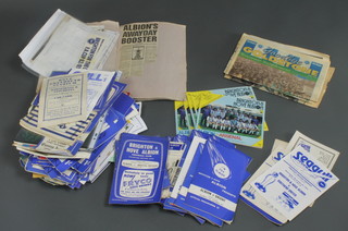 A box containing a collection of various Brighton & Hove Albion FC programmes and ephemera, mostly from the 1960's 