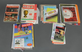 A box containing various football programmes including Cup Finals, Semi-Finals, testimonials etc, a 1959 FCA final, a 1955 England V Scotland