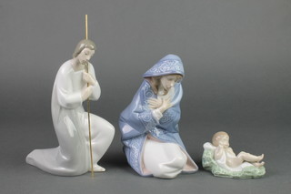 Three Lladro figures - Mary 5477 8", Joseph 4533 8 1/2" and Jesus 5473 4" 