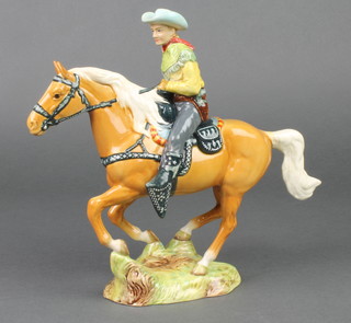 A Beswick figure of a cowboy on horseback no.1377 9 1/2" 